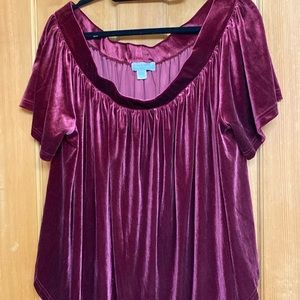 Burgundy velvet top.